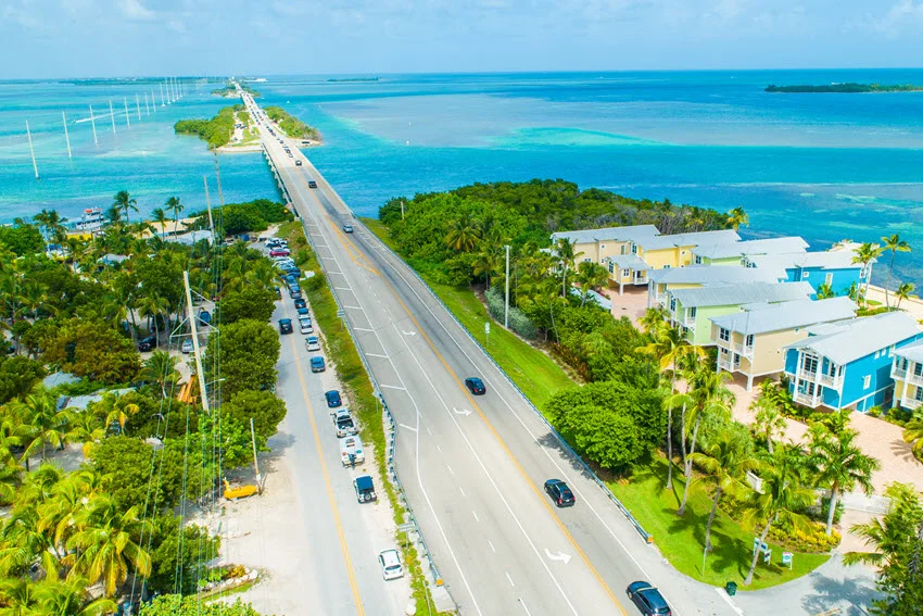 Aerial shot of the Overseas Highway in the Florida Keys, a classic gateway to offshore waters where Amberjack trips are popular with visiting anglers.