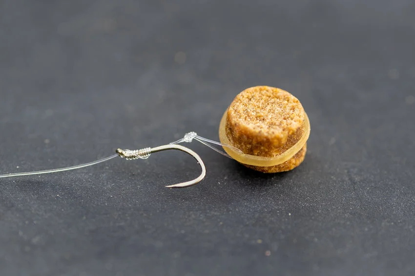 Close up view of a hair rig with a boilie on the bait stop, a popular Carp presentation.