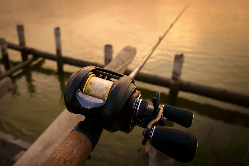 Close view of bait finesse gear with a light baitcasting reel and finesse lure for ultralight fishing.