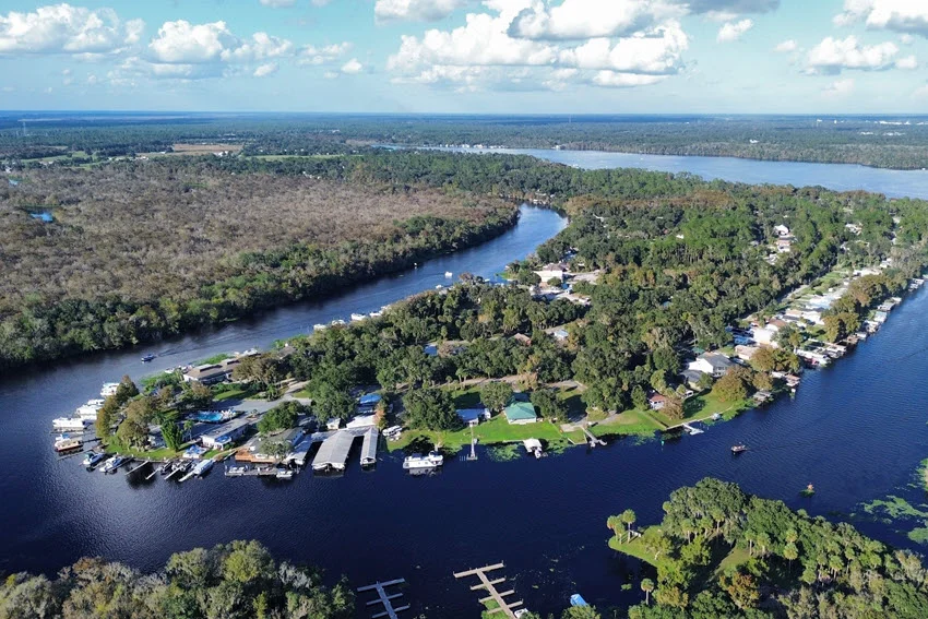 Aerial view of a Florida river system with docks, channels, and connected backwaters that can provide productive Catfish habitat.