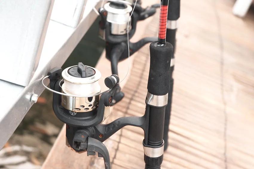 Close shot of heavy fishing gear rigged for Cobia fishing, including rods, reels, and tackle prepared for offshore action.