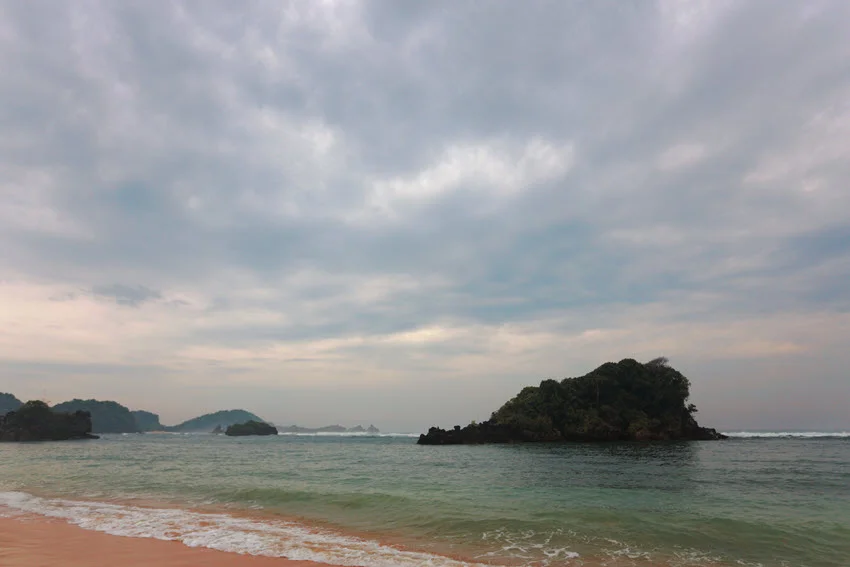 Cloudy morning on the coast with a restless sea after a rainstorm.