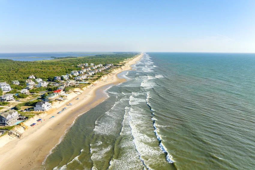 Aerial view along Corolla Beach in the Outer Banks, North Carolina, showing the Atlantic shoreline used by Surf fishing anglers.