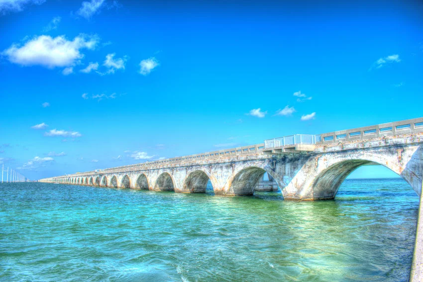 Old Seven Mile Bridge in the Florida Keys over clear turquoise water, one of the best-known areas for Spanish Mackerel fishing during seasonal coastal runs.