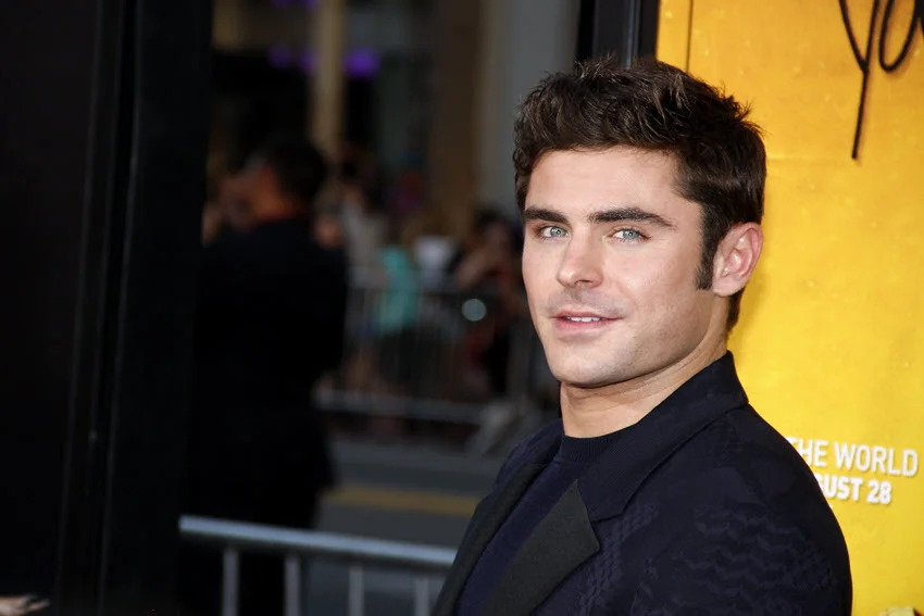 Zac Efron poses during the premiere of "We Are Your Friends" at the TCL Chinese Theater in Hollywood.