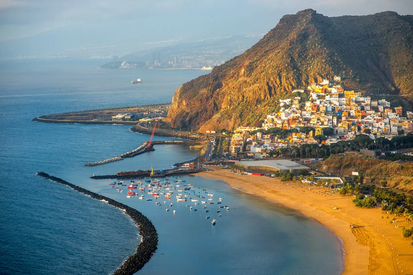Scenic view of Teresitas Beach with golden sand and calm waters along Tenerife coast.